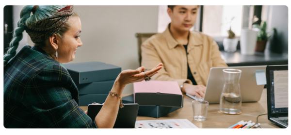 Marketers discuss strategy around a conference table