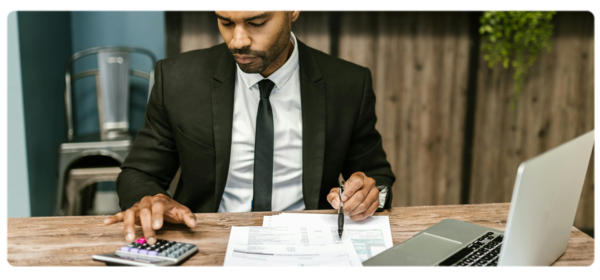 Accountant looks over financial documents